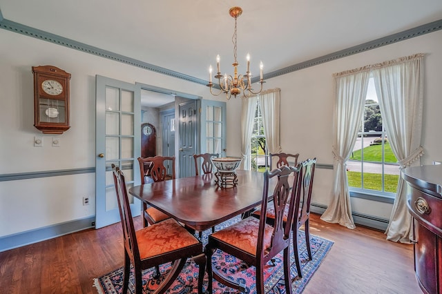 2 Seaview Ln, Mount Sinai, NY 11766 - dining space with a chandelier, light wood-style flooring, and french doors