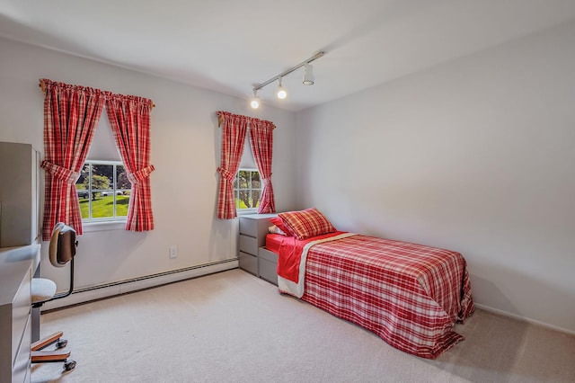 2 Seaview Ln, Mount Sinai, NY 11766 - carpeted bedroom featuring baseboard heating and rail lighting