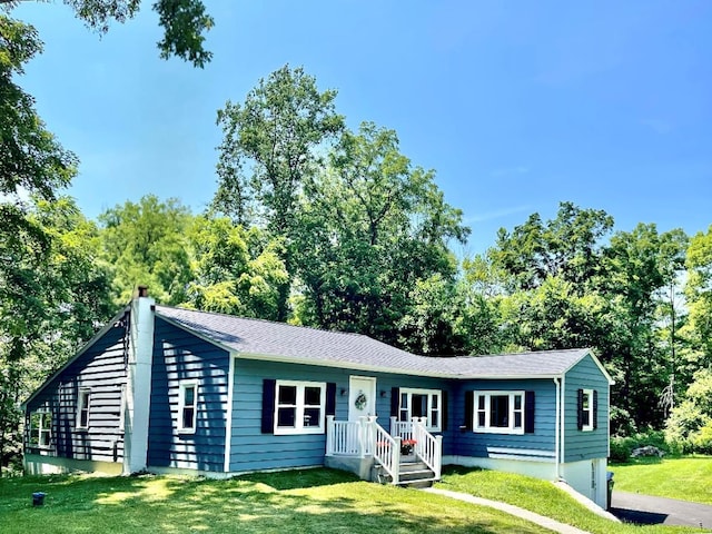 12 Russell Rd, Wappingers Falls, NY 12590 - view of front of property with a front yard and a chimney
