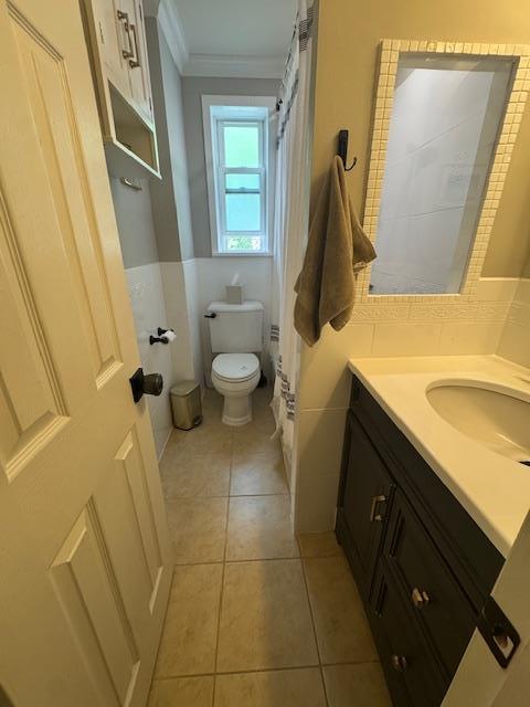 47 Hilltop Acres Unit 47, Yonkers, NY 10704 - full bath featuring ornamental molding, vanity, and tile patterned floors