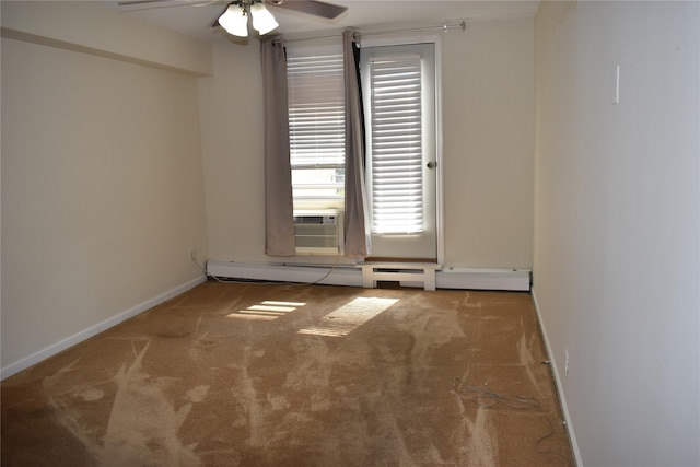 596 Broadway Unit 10B, Lynbrook, NY 11563 - carpeted empty room featuring a ceiling fan, a baseboard radiator, and cooling unit