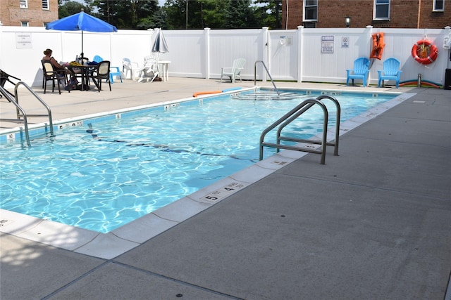596 Broadway Unit 10B, Lynbrook, NY 11563 - community pool featuring a patio