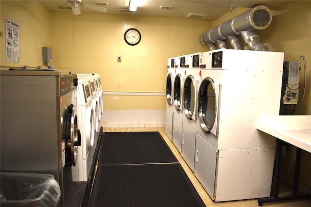 596 Broadway Unit 10B, Lynbrook, NY 11563 - community laundry with washing machine and clothes dryer and ceiling fan