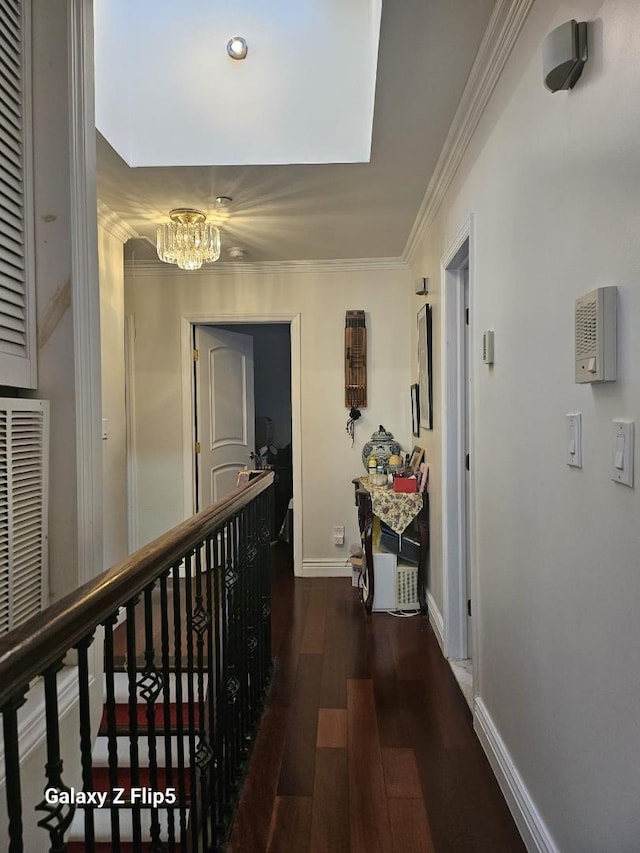 13035 126th S, Ozone Park, NY 11420 - hallway with a chandelier, wood finished floors, ornamental molding, and an upstairs landing