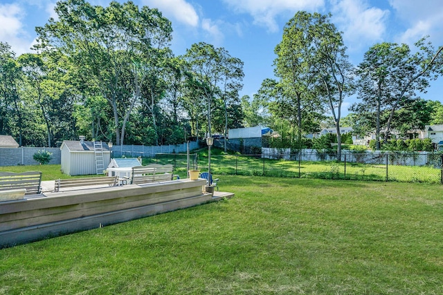26 Liber Blvd, Farmingville, NY 11738 - fenced backyard featuring a storage shed
