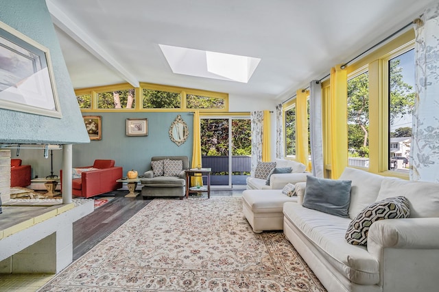 26 Liber Blvd, Farmingville, NY 11738 - sunroom / solarium with a skylight, wood finished floors, and vaulted ceiling