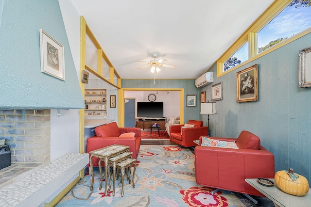 26 Liber Blvd, Farmingville, NY 11738 - living area with a ceiling fan, a wall unit AC, wood finished floors, and a wood stove