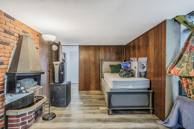 26 Liber Blvd, Farmingville, NY 11738 - bedroom featuring light wood finished floors and wooden walls