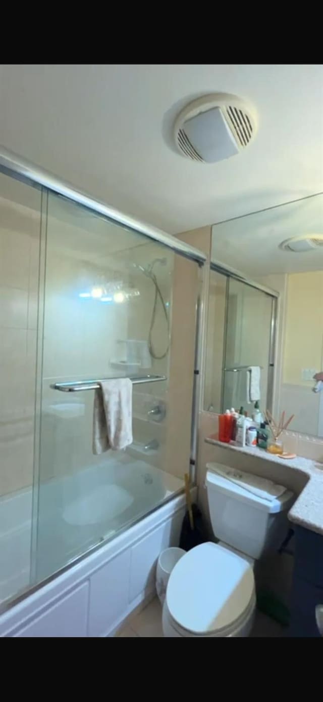 180 Bch 101st St Unit 3C, Rockaway Beach, NY 11694 - bathroom featuring bath / shower combo with glass door and vanity