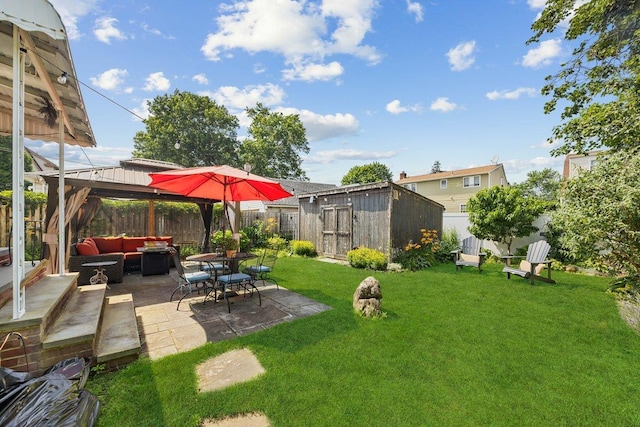 19 Russell St, Roslyn Heights, NY 11577 - fenced backyard featuring an outdoor living space, a storage shed, a patio, and a gazebo