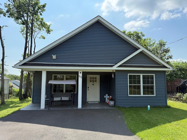 153 Ridgewood Ave, Middletown, NY 10940 - view of front of house featuring a front lawn and covered porch