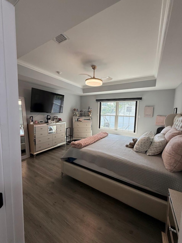 153 Ridgewood Ave, Middletown, NY 10940 - bedroom with a raised ceiling, dark wood-style floors, and ornamental molding