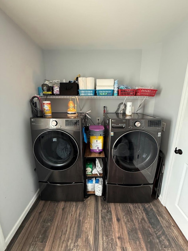 153 Ridgewood Ave, Middletown, NY 10940 - laundry area with wood finished floors and washing machine and dryer