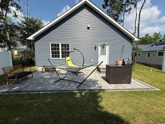 153 Ridgewood Ave, Middletown, NY 10940 - rear view of property featuring a lawn and a patio area