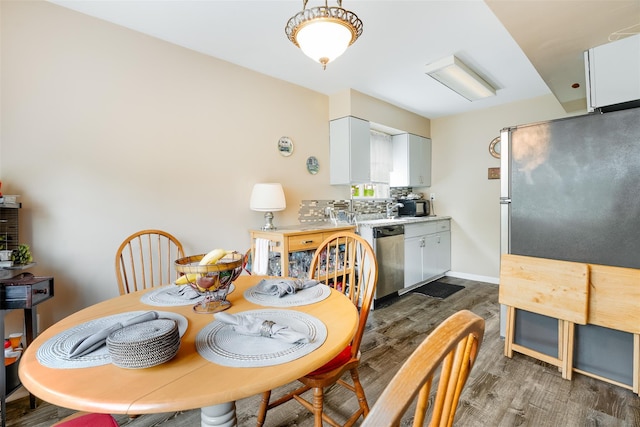 26 Cooper Rd Unit 416, Poughkeepsie, NY 12603 - dining room featuring dark wood-style floors
