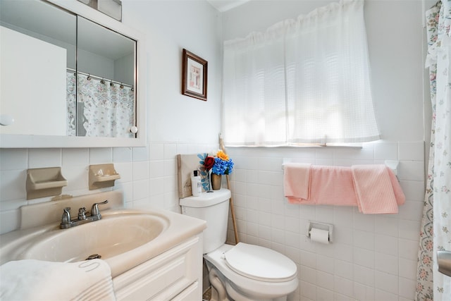 26 Cooper Rd Unit 416, Poughkeepsie, NY 12603 - bathroom featuring tile walls, vanity, and a shower with curtain