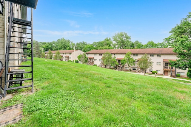 26 Cooper Rd Unit 416, Poughkeepsie, NY 12603 - view of green lawn featuring stairs and a residential view