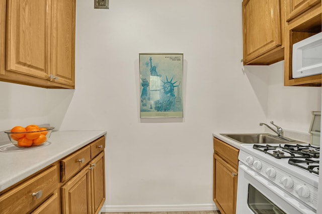293 Riverside Dr Unit 4B, New York Manhattan, NY 10025 - kitchen featuring white appliances and light countertops