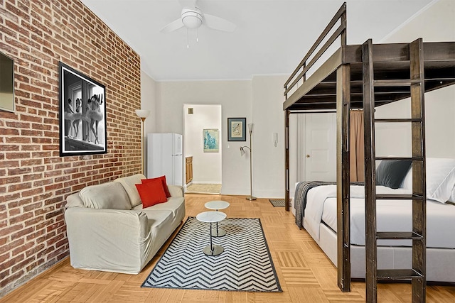 293 Riverside Dr Unit 4B, New York Manhattan, NY 10025 - living area with brick wall, ceiling fan, and ornamental molding