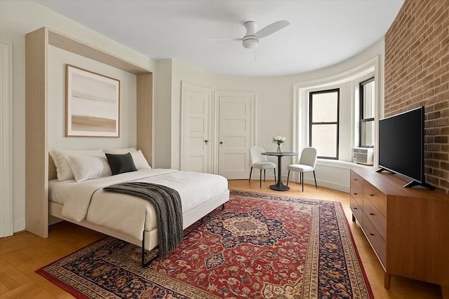 293 Riverside Dr Unit 4B, New York Manhattan, NY 10025 - bedroom with brick wall and ceiling fan