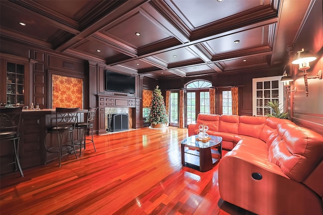 11 Black Rock Rd, Muttontown, NY 11545 - living room featuring wood finished floors, a decorative wall, a fireplace, ornamental molding, and coffered ceiling