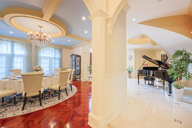 11 Black Rock Rd, Muttontown, NY 11545 - dining area with ornate columns, ornamental molding, a chandelier, arched walkways, and a decorative wall
