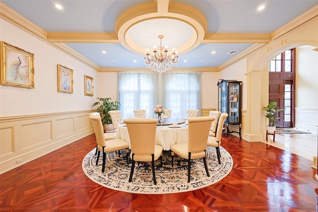 11 Black Rock Rd, Muttontown, NY 11545 - dining room featuring a decorative wall, plenty of natural light, arched walkways, crown molding, and a chandelier