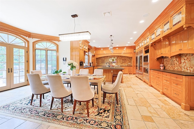 11 Black Rock Rd, Muttontown, NY 11545 - dining space featuring a chandelier, recessed lighting, french doors, and stone tile flooring