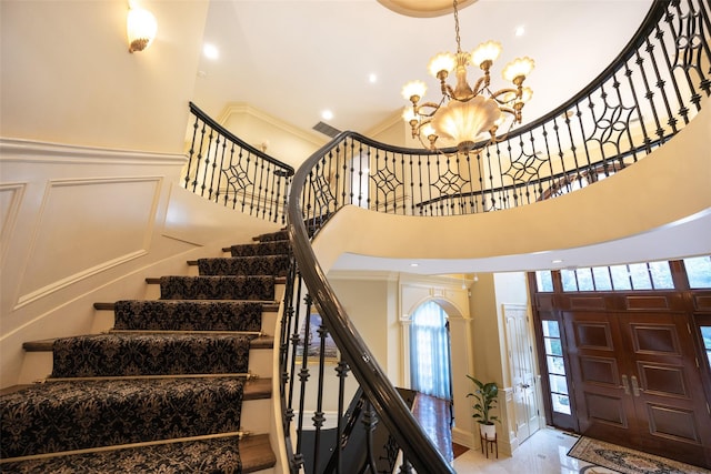 11 Black Rock Rd, Muttontown, NY 11545 - foyer featuring a chandelier, stairway, ornamental molding, and a high ceiling