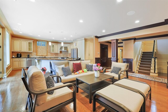 11 Black Rock Rd, Muttontown, NY 11545 - living area with ornamental molding, ornate columns, light wood-style flooring, recessed lighting, and stairway