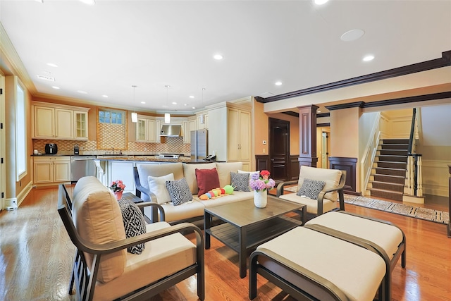 11 Black Rock Rd, Muttontown, NY 11545 - living room with ornamental molding, ornate columns, light wood finished floors, recessed lighting, and stairs