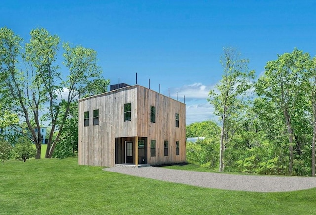 410 Aquaview Ave, East Marion, NY 11939 - rear view of property with a yard