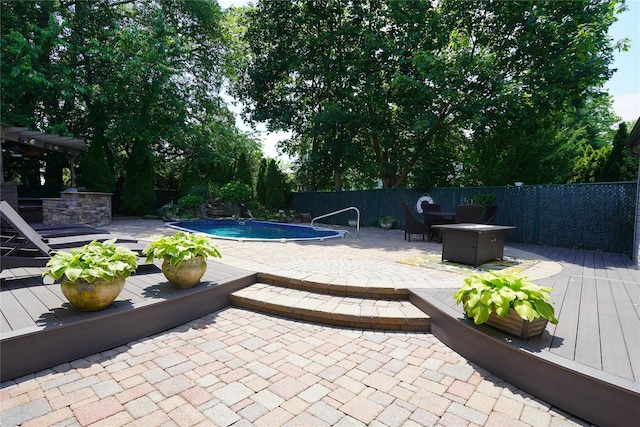 342 Mildred St, Oceanside, NY 11572 - view of pool featuring a deck, a patio, and a fire pit