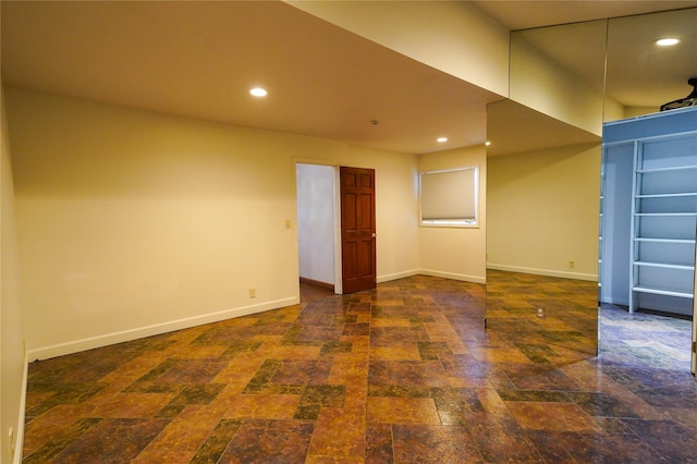 342 Mildred St, Oceanside, NY 11572 - spare room featuring recessed lighting and stone finish flooring