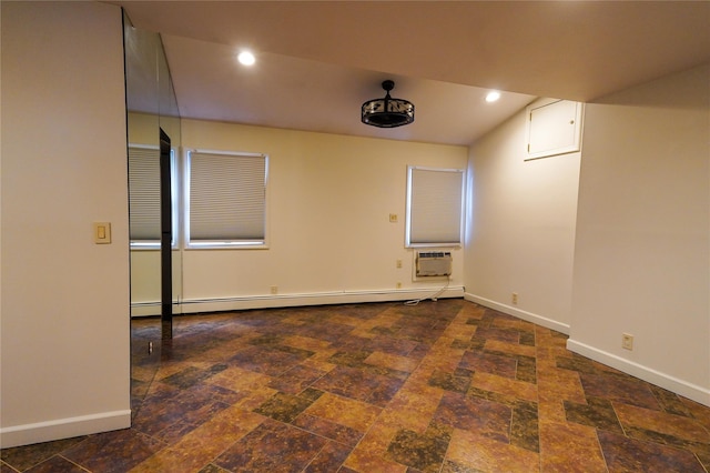 342 Mildred St, Oceanside, NY 11572 - unfurnished room with stone finish flooring, recessed lighting, a baseboard heating unit, and a wall mounted AC