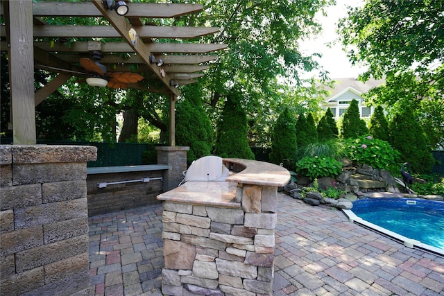 342 Mildred St, Oceanside, NY 11572 - view of patio / terrace with a pergola, ceiling fan, and an outdoor pool