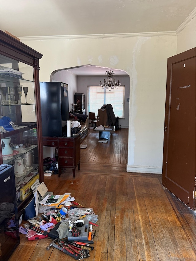 2449 92nd St, East Elmhurst, NY 11369 - living room featuring hardwood / wood-style floors, arched walkways, a chandelier, and ornamental molding