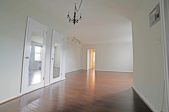5621 Netherland Ave Unit 5C, Bronx, NY 10471 - unfurnished room featuring wood finished floors and a chandelier