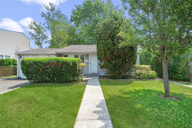 337 Atlantic Ave, Massapequa Park, NY 11762 - view of front of property with a front yard