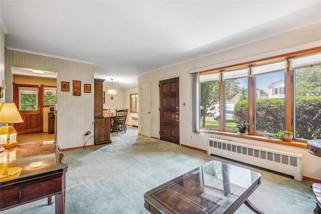 337 Atlantic Ave, Massapequa Park, NY 11762 - carpeted living area featuring radiator, ornamental molding, and wallpapered walls