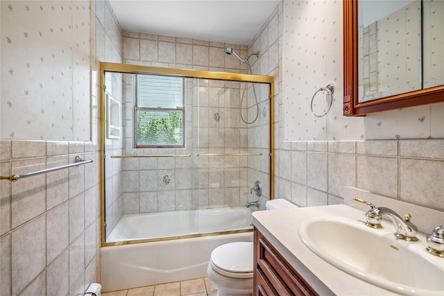 337 Atlantic Ave, Massapequa Park, NY 11762 - full bath featuring tile walls, enclosed tub / shower combo, vanity, tile patterned flooring, and wallpapered walls