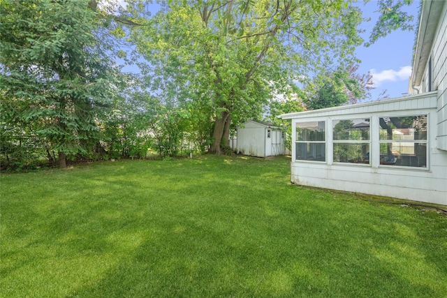 337 Atlantic Ave, Massapequa Park, NY 11762 - view of grassy yard featuring a storage unit