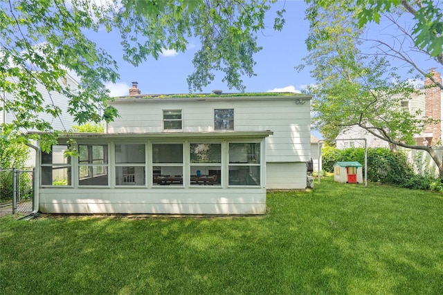 337 Atlantic Ave, Massapequa Park, NY 11762 - back of house with a sunroom and a chimney