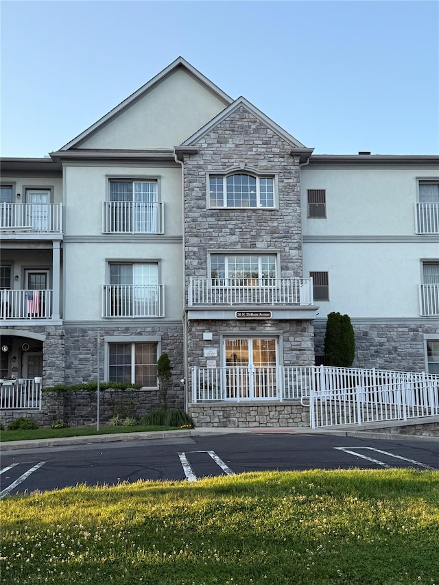 26 N De Baun Ave Unit 303, Suffern, NY 10901 - view of property featuring uncovered parking
