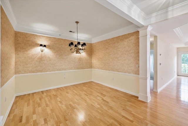26 N De Baun Ave Unit 303, Suffern, NY 10901 - unfurnished dining area featuring decorative columns, wood finished floors, crown molding, a chandelier, and wallpapered walls