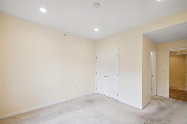 26 N De Baun Ave Unit 303, Suffern, NY 10901 - unfurnished bedroom with light colored carpet, a closet, and recessed lighting