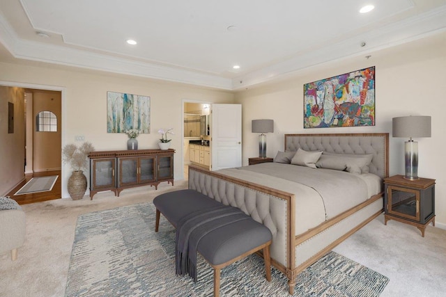 26 N De Baun Ave Unit 303, Suffern, NY 10901 - bedroom with a tray ceiling, light carpet, ornamental molding, recessed lighting, and ensuite bathroom