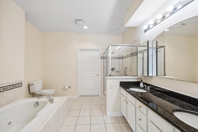 26 N De Baun Ave Unit 303, Suffern, NY 10901 - bathroom featuring double vanity, a stall shower, a whirlpool tub, and tile patterned floors