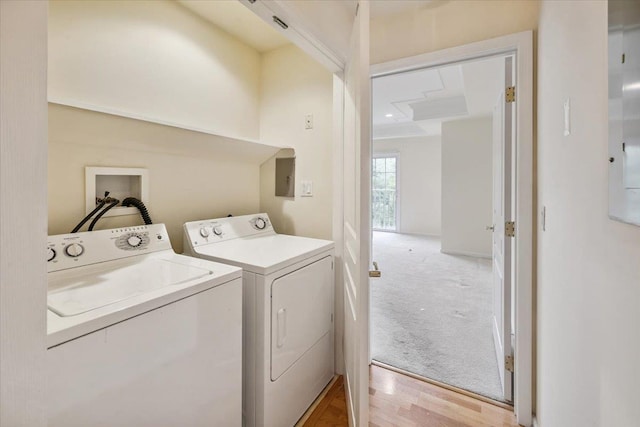 26 N De Baun Ave Unit 303, Suffern, NY 10901 - laundry area with washing machine and clothes dryer and light wood-style floors