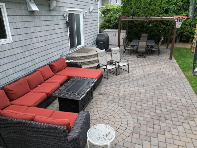 15 Cedar Dr E, Plainview, NY 11803 - view of patio featuring an outdoor hangout area, outdoor dining area, a storage shed, and a grill
